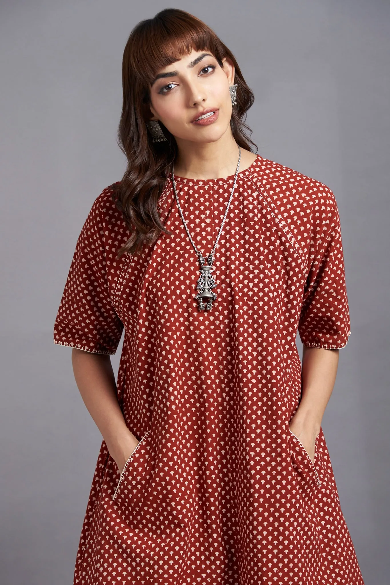 crimson craze - drop shoulder modern tunic with pockets