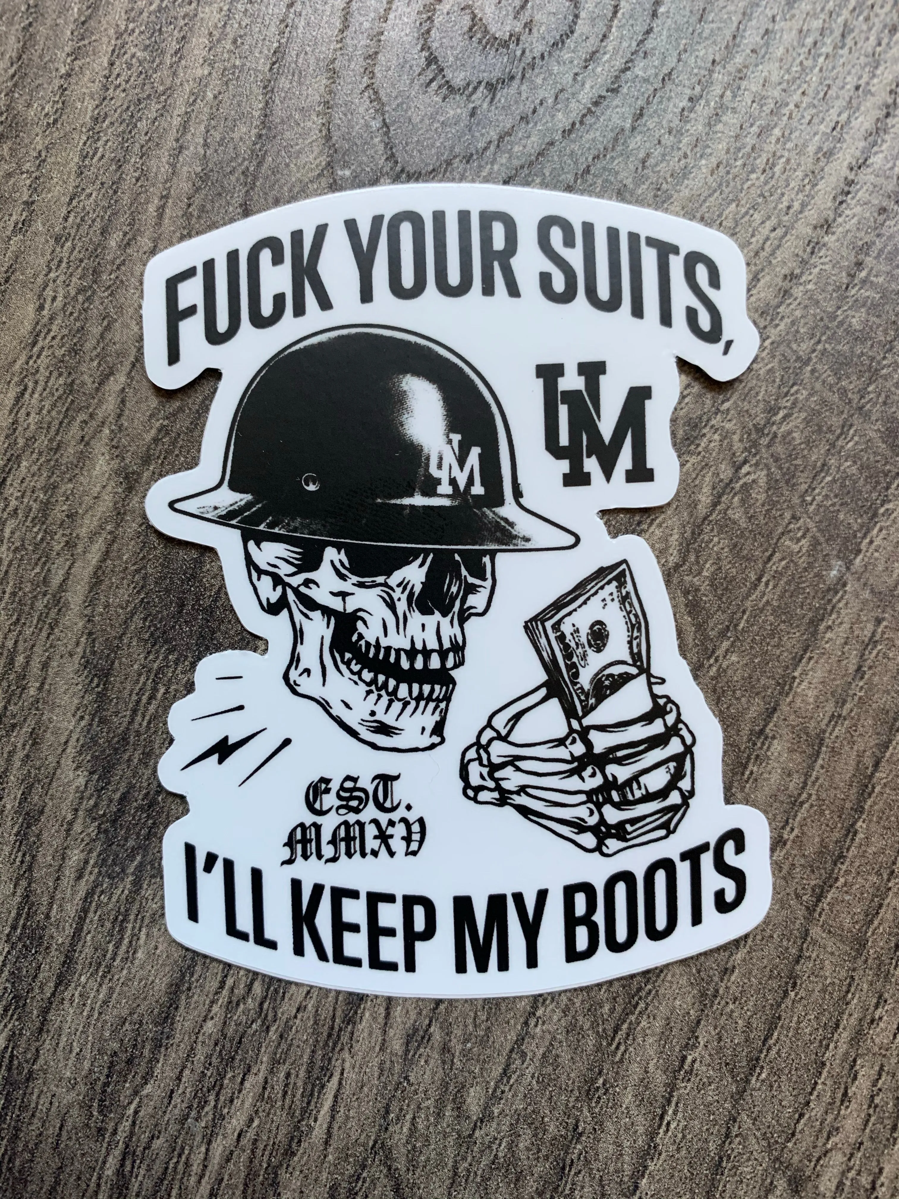 Fuck your suits I’ll keep my boots